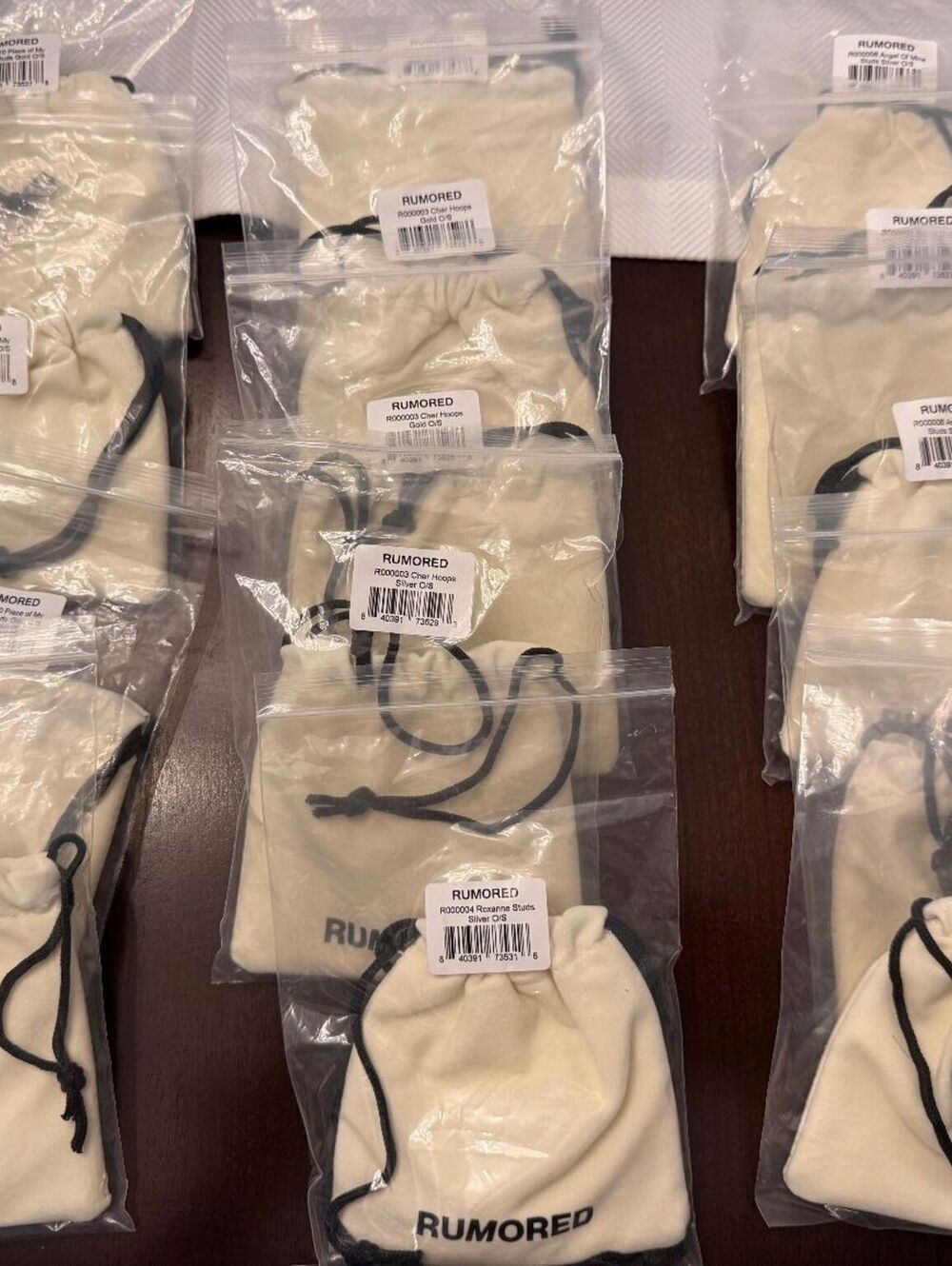 Rumored earrings 14pc reseller box NEW with Tags and Pouch